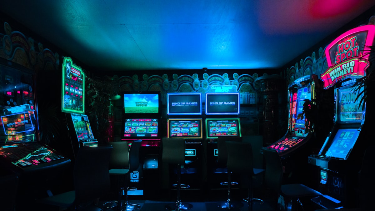 Neon-lit slot machines on a casino floor
