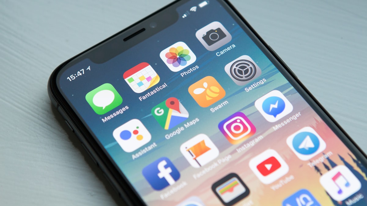 Smartphone home screen showing application icons